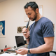 Andrew brushing his teeth with the Black edition Philips Sonicare DiamondClean power toothbrush.